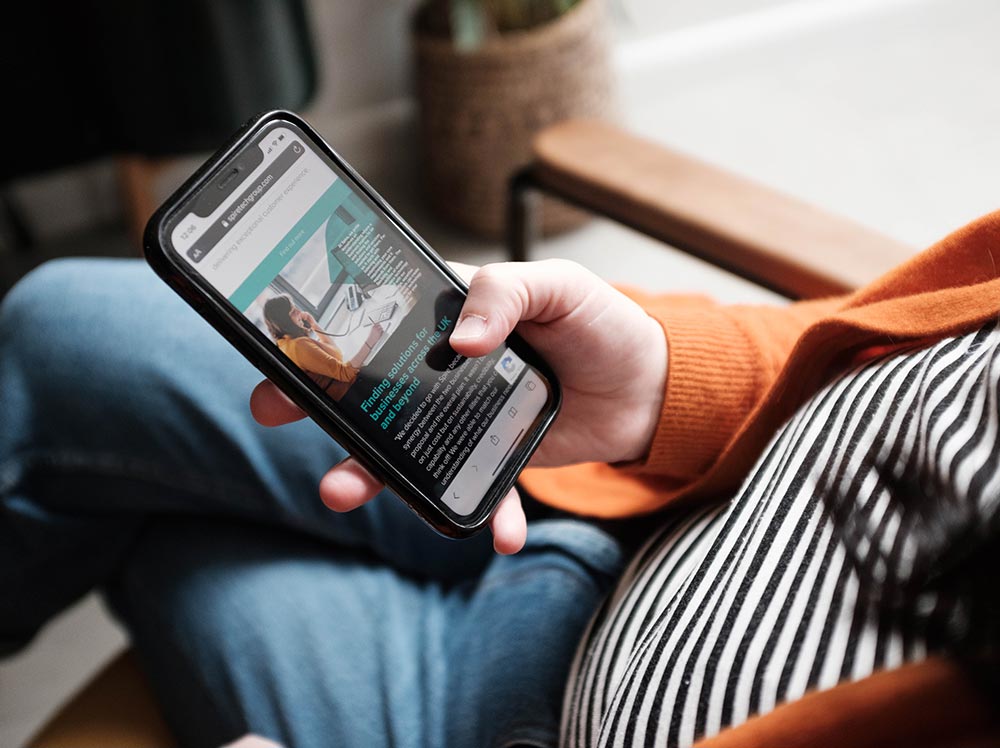 Girl looking at a website on a mobile phone